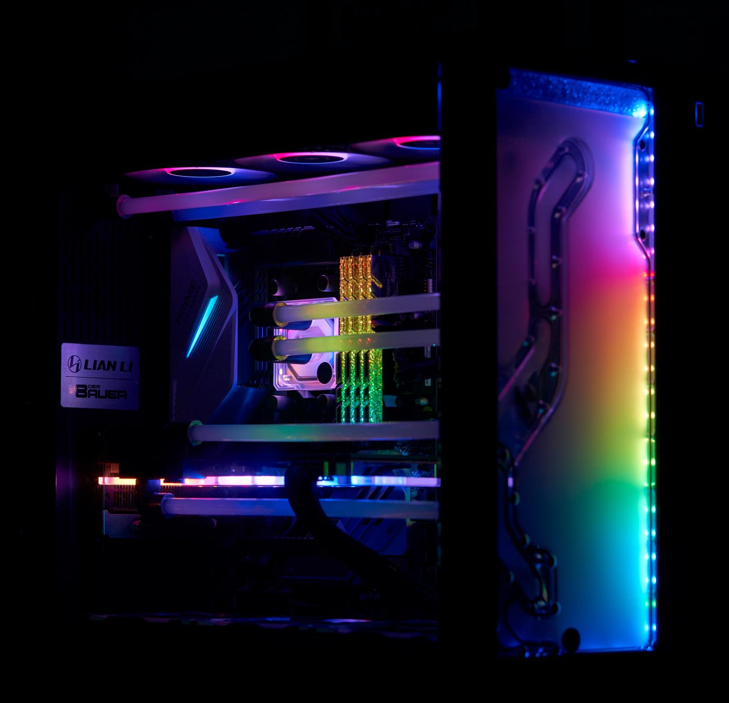 Caja de PC gaming de gama alta con efectos de degradado RGB vibrantes en sus componentes internos.